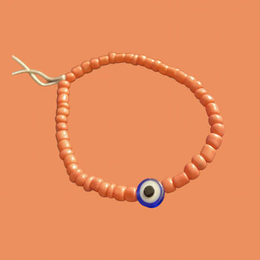 Coral evil eye bracelet